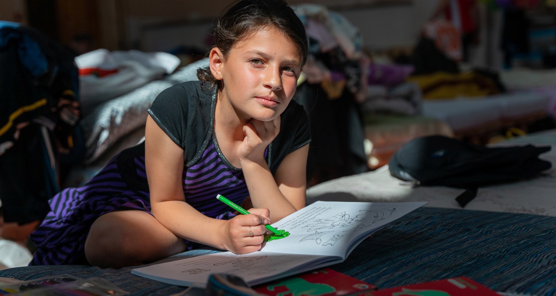Credit Paul Wu:Redd Barna Olesia, 10, Drawing On Her Bed In The School Gym Credit